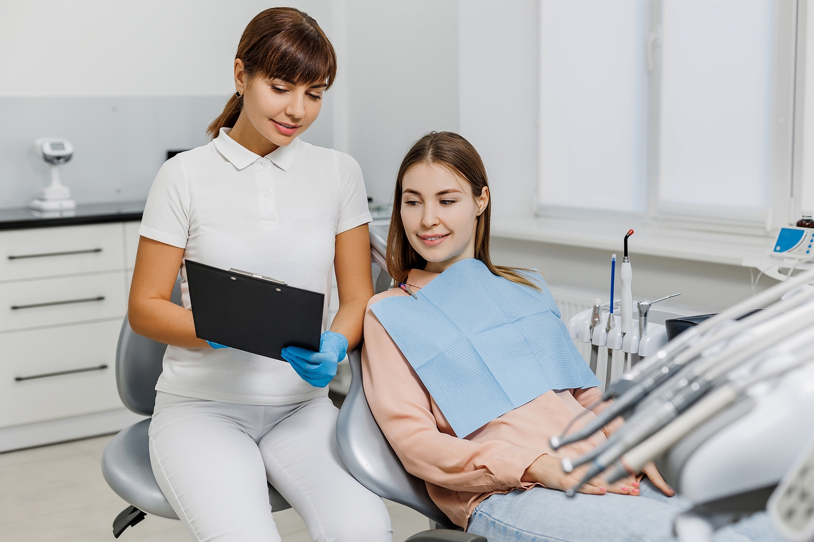 Dentist discussing a personalized Smile Design treatment plan with a patient at Greater Dental Health
